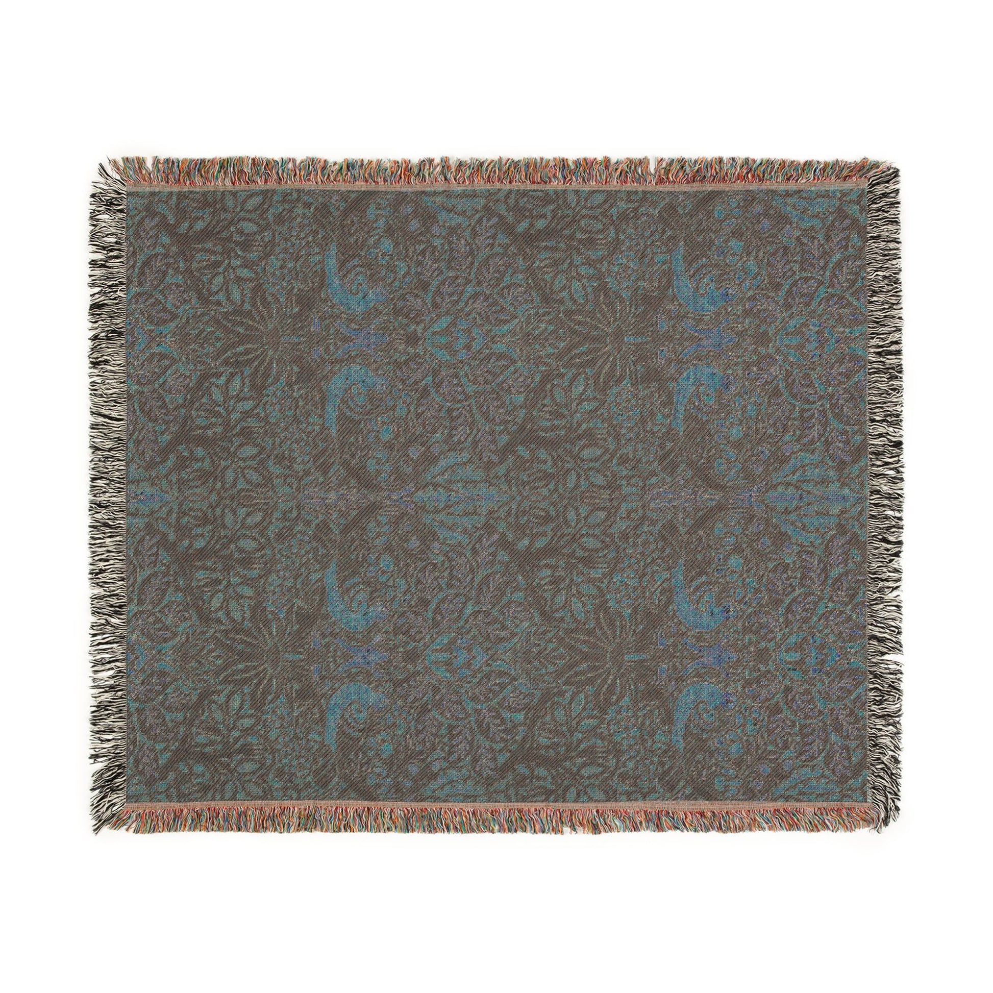 Decorative throw blanket with a floral pattern on a white background