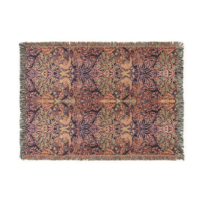 Decorative throw blanket with floral pattern on a white background