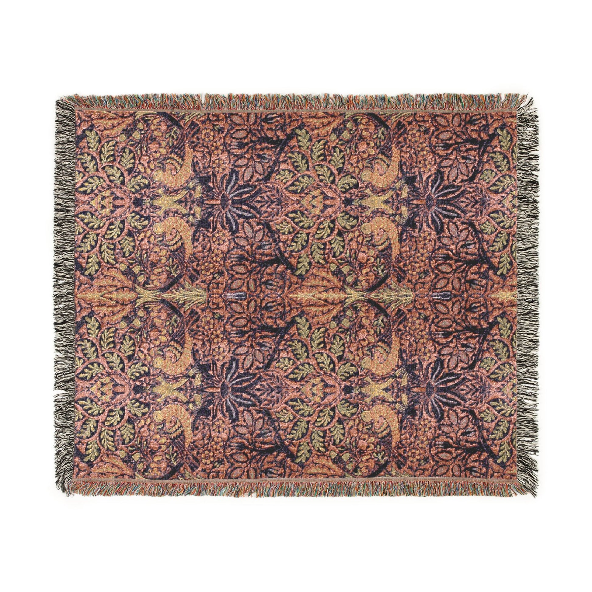 Patterned throw blanket with fringe on a white background