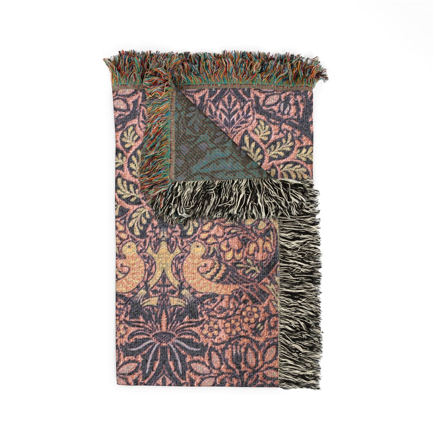 Decorative throw blanket with intricate patterns and fringes on a white background