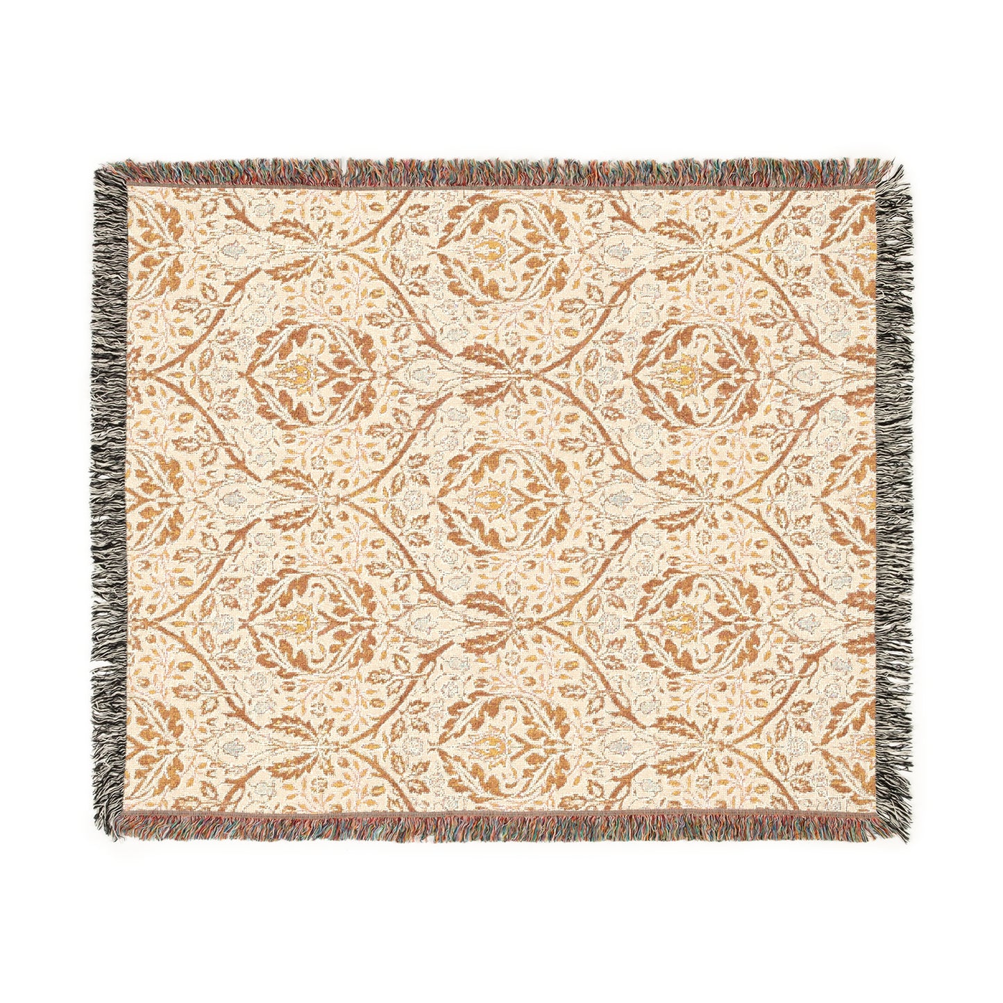 A woven cotton blanket with a geometric pattern in beige, brown, and multicolor, with fringed edges.