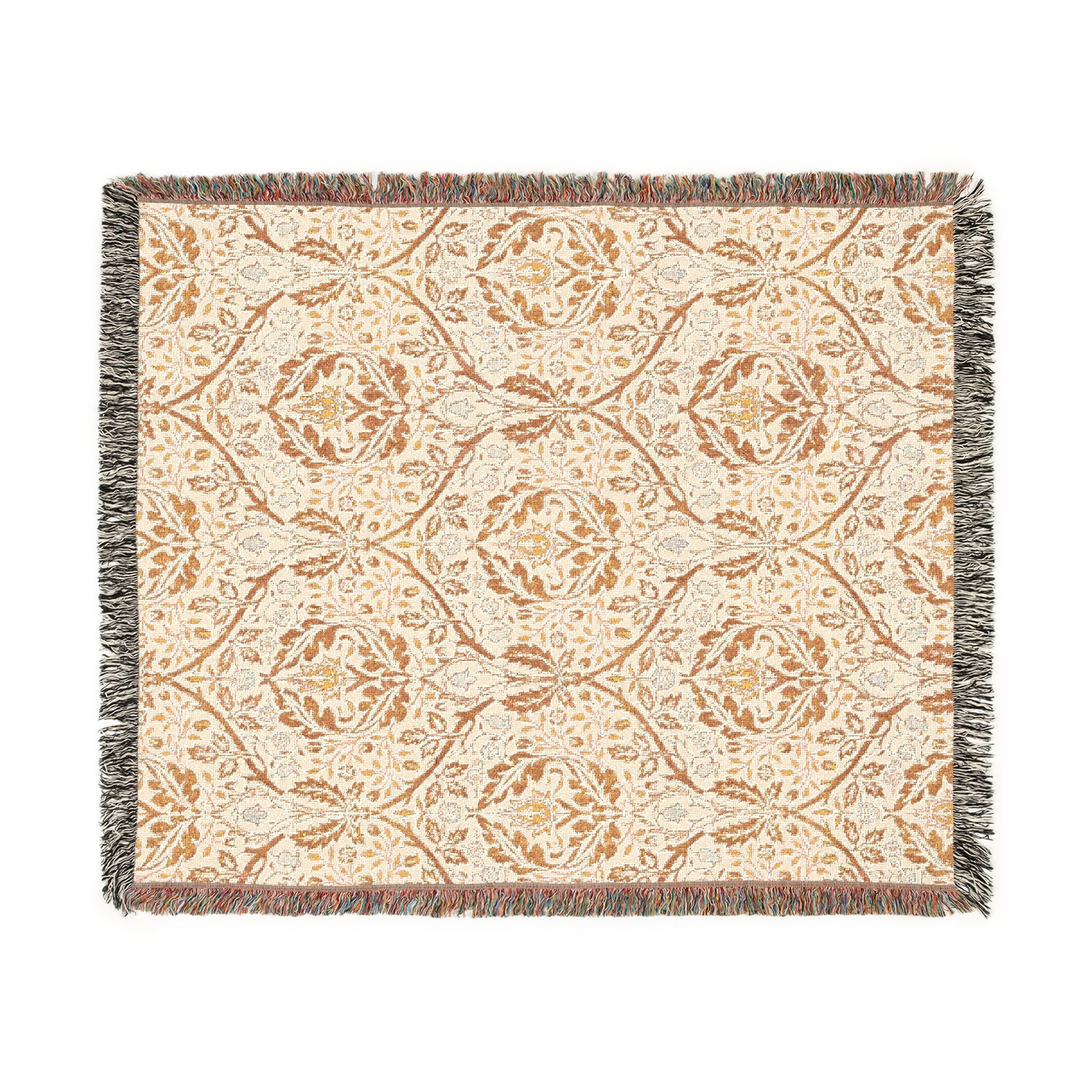 A woven cotton blanket with a geometric pattern in beige, brown, and multicolor, with fringed edges.