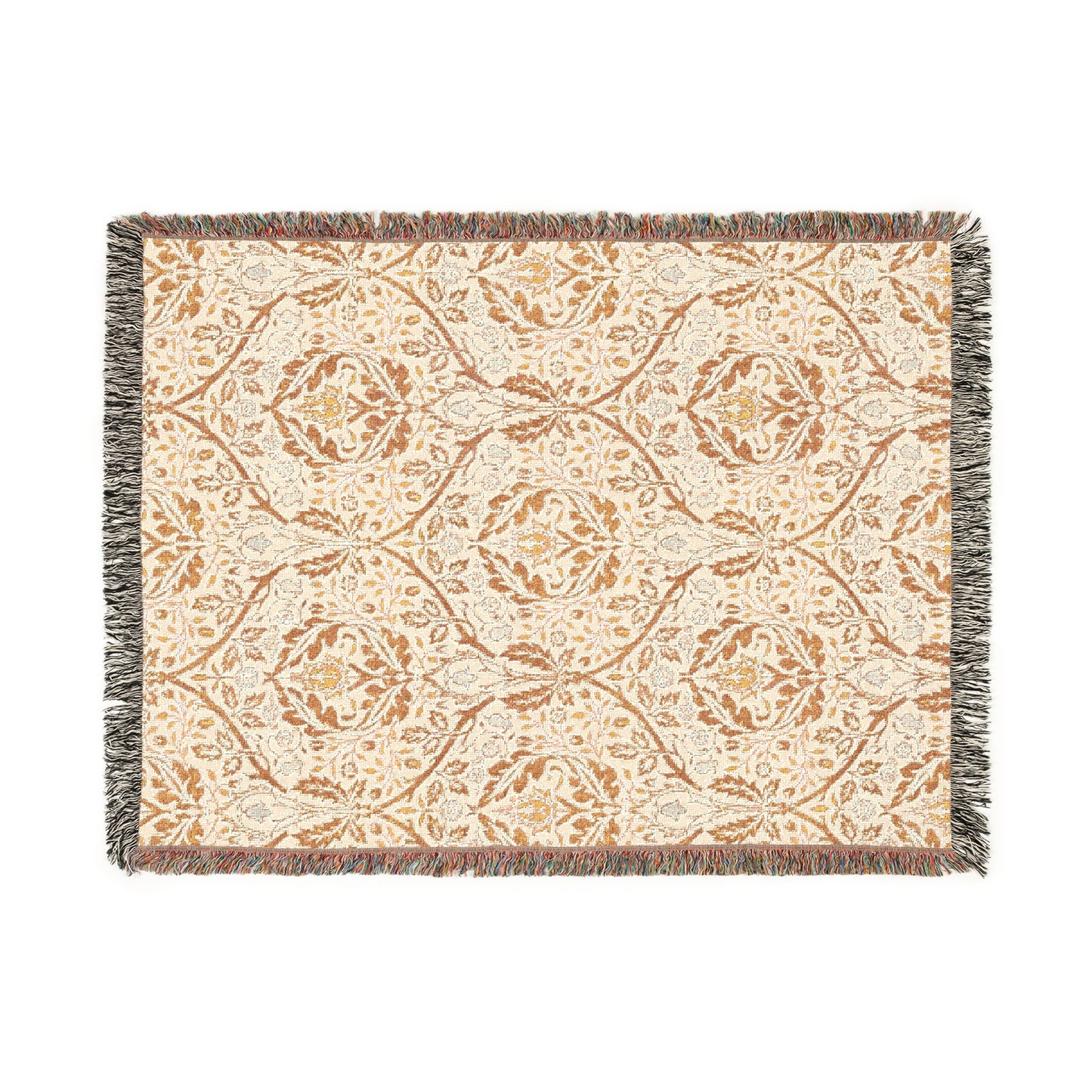 A woven cotton blanket with a geometric pattern in beige, brown, and multicolor, with fringed edges.