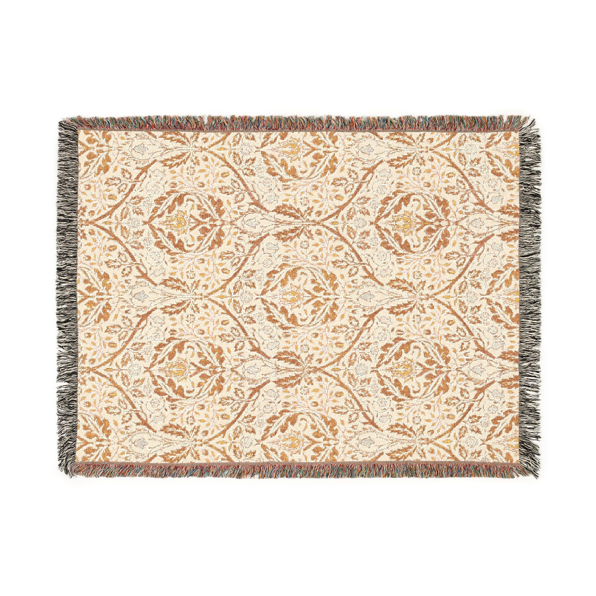 A woven cotton blanket with a geometric pattern in beige, brown, and multicolor, with fringed edges.
