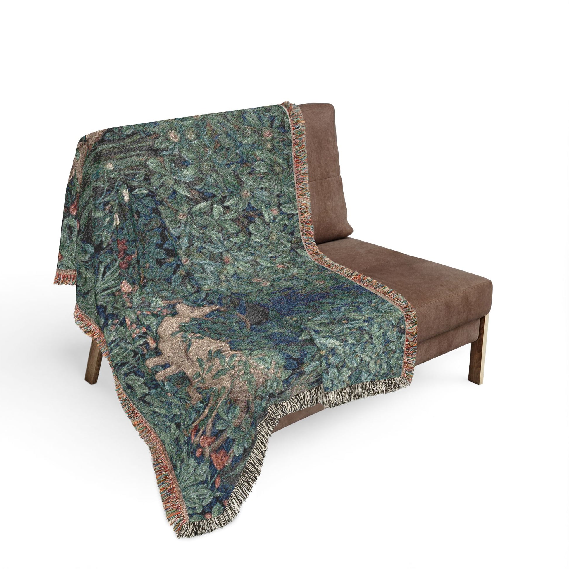 Decorative blanket with nature-themed design draped over a brown chair on a white background