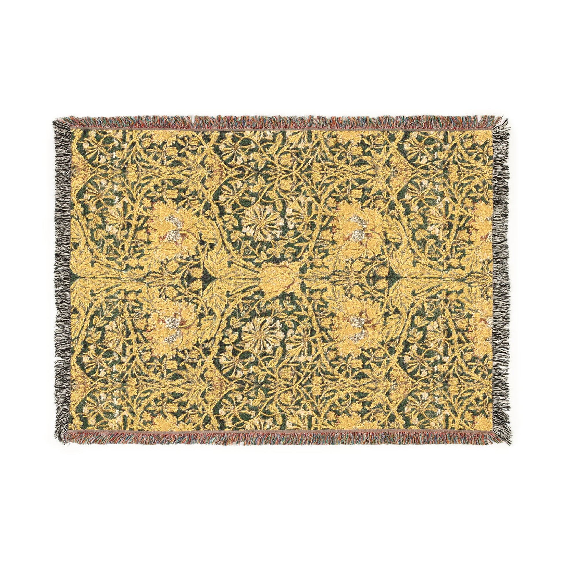 Floral patterned throw blanket with a green and yellow design on a white background