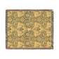 Decorative throw blanket with a yellow and green pattern on a white background