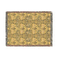 Yellow patterned rug with fringe on a white background