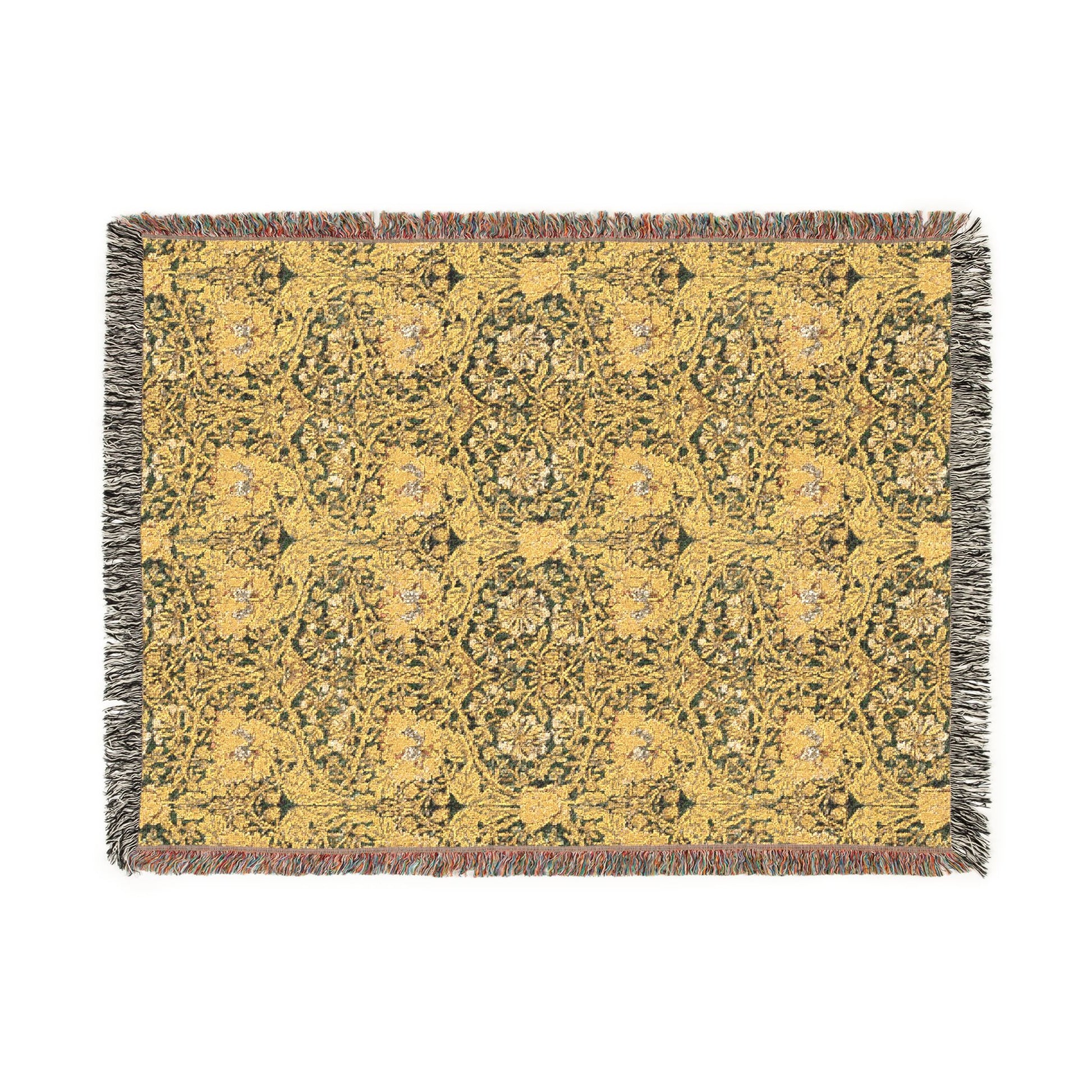 Yellow patterned rug with fringe on a white background