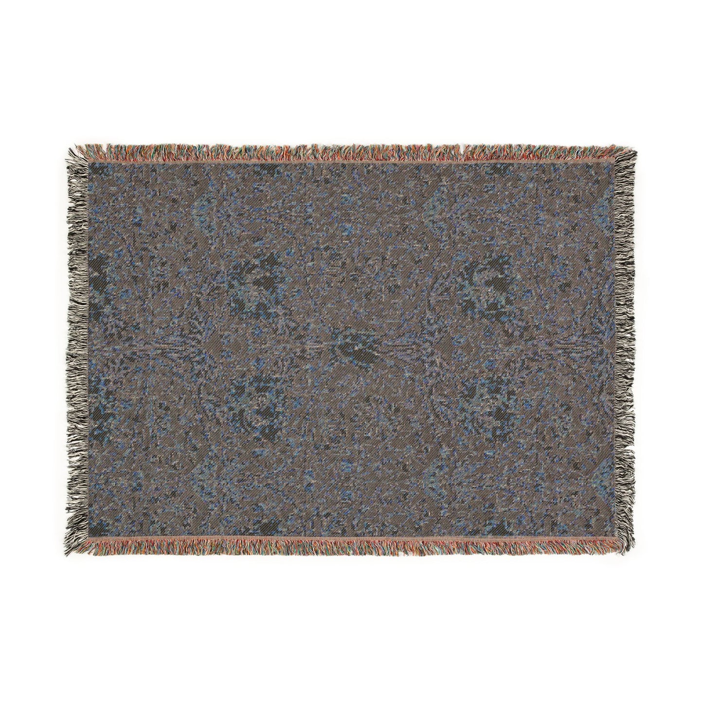 Textured throw blanket with a pattern on a white background