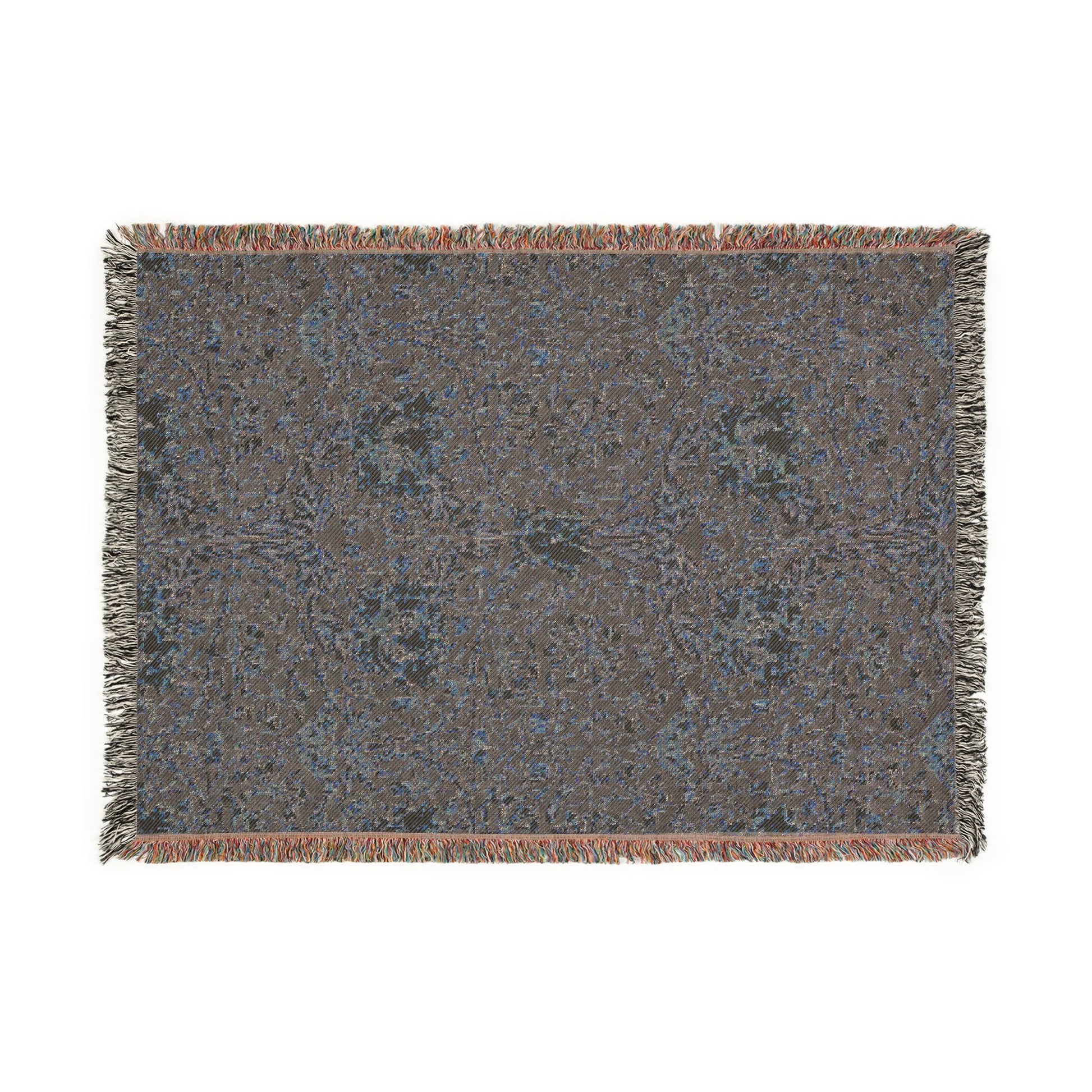 Textured throw blanket with a pattern on a white background