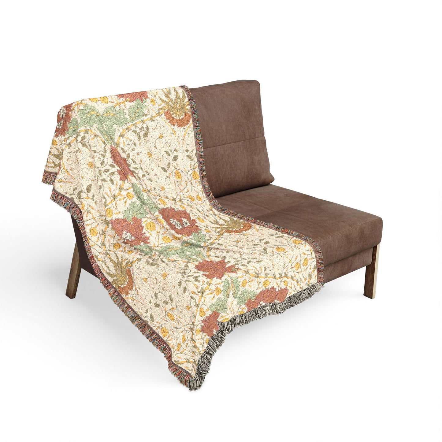 Brown chair with a floral-patterned throw blanket on a white background