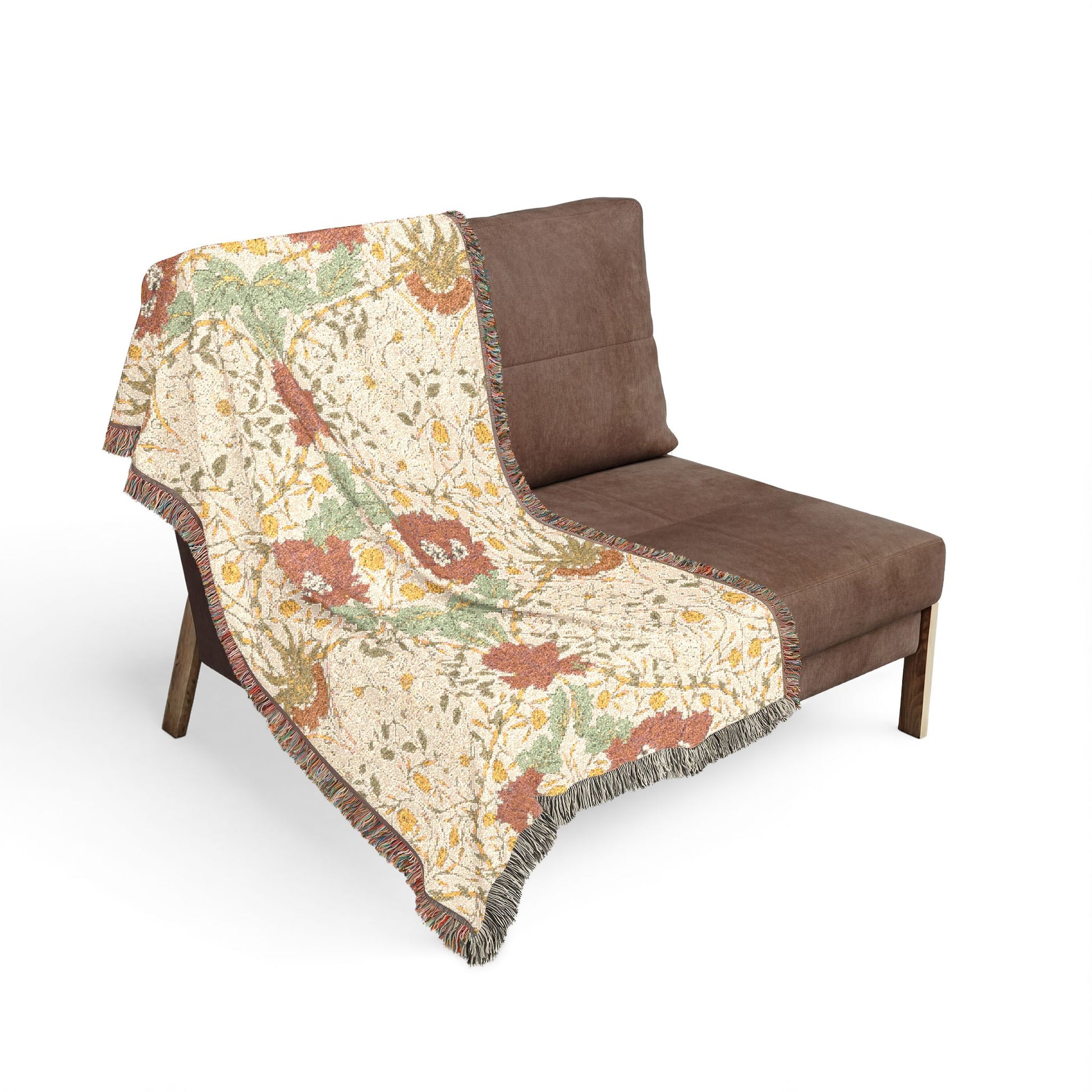 Brown chair with a floral-patterned throw blanket on a white background