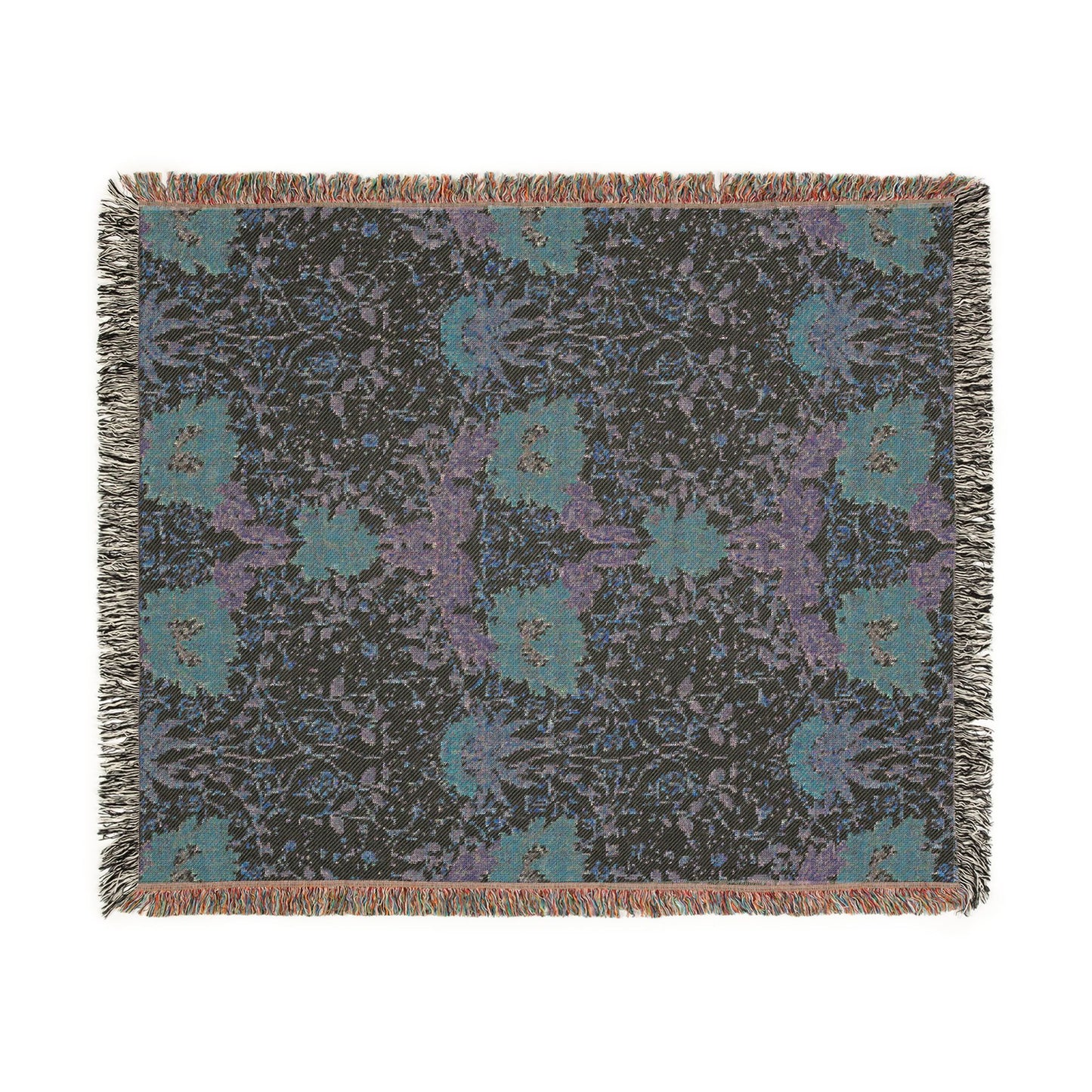 Floral patterned throw blanket with fringe on a white background