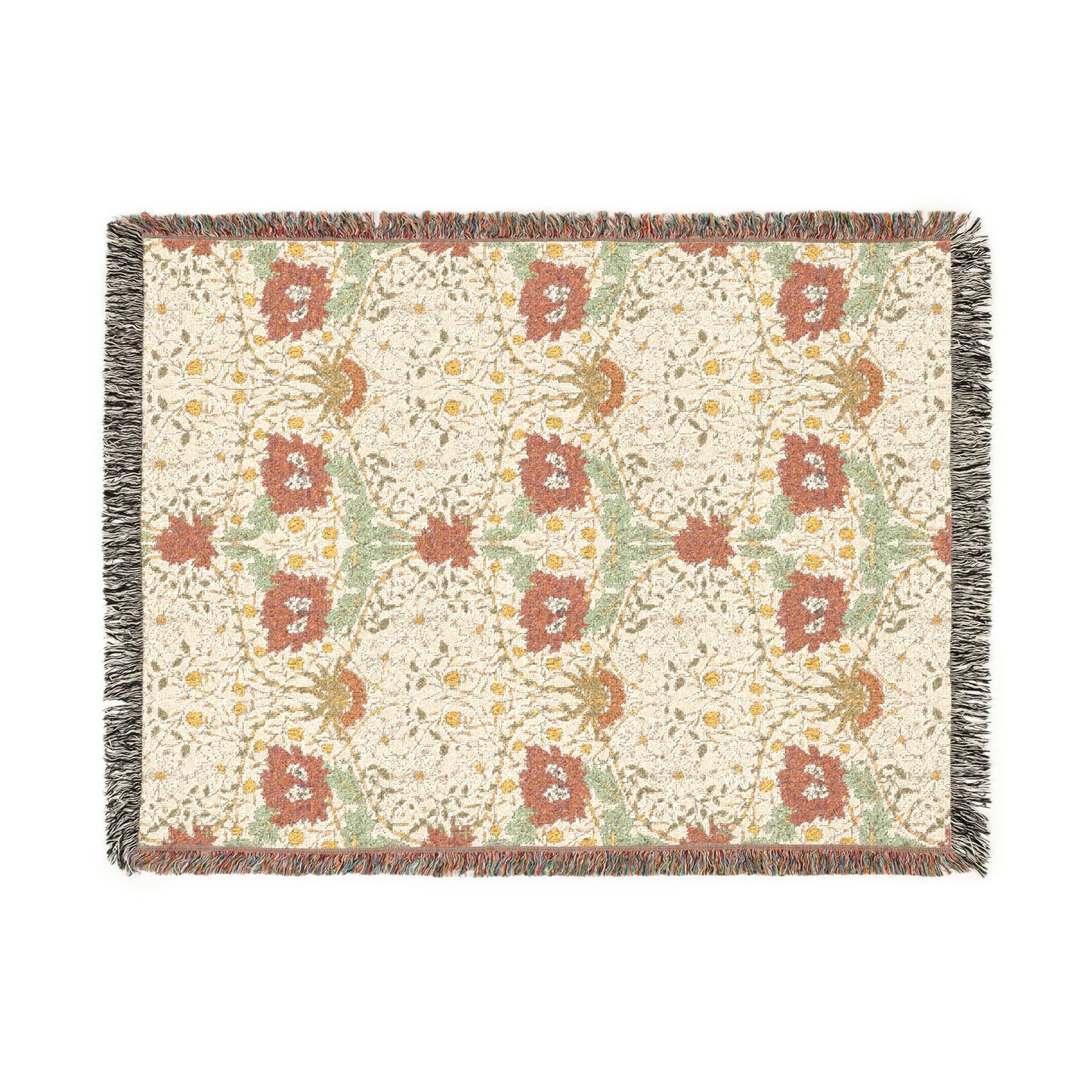 Floral patterned throw blanket with fringe on a white background