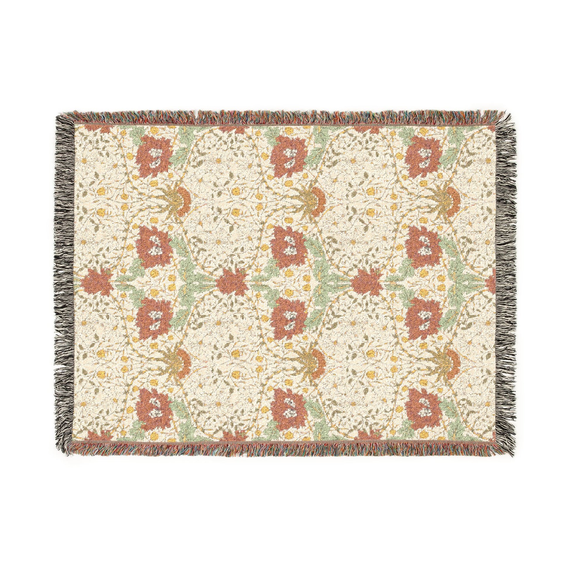Floral patterned throw blanket with fringe on a white background