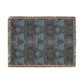 Floral patterned throw blanket on a white background