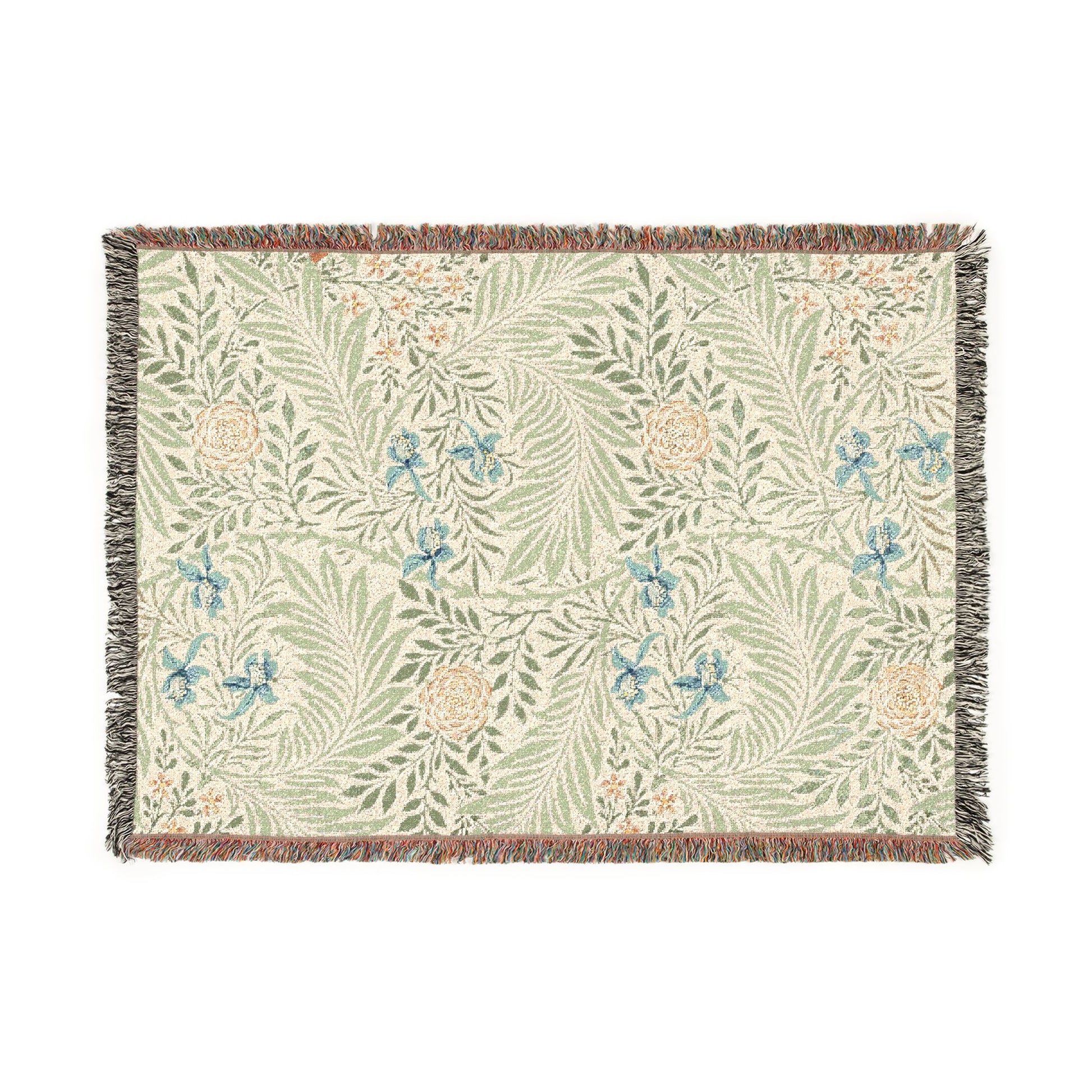 Floral patterned throw blanket with green leaves and blue flowers on a white background
