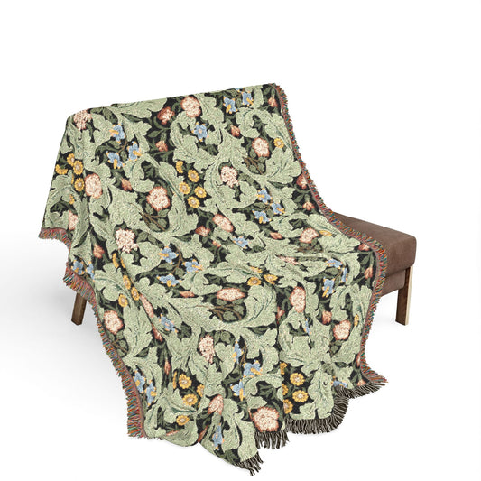 Black and white striped blanket draped over a chair on a white background