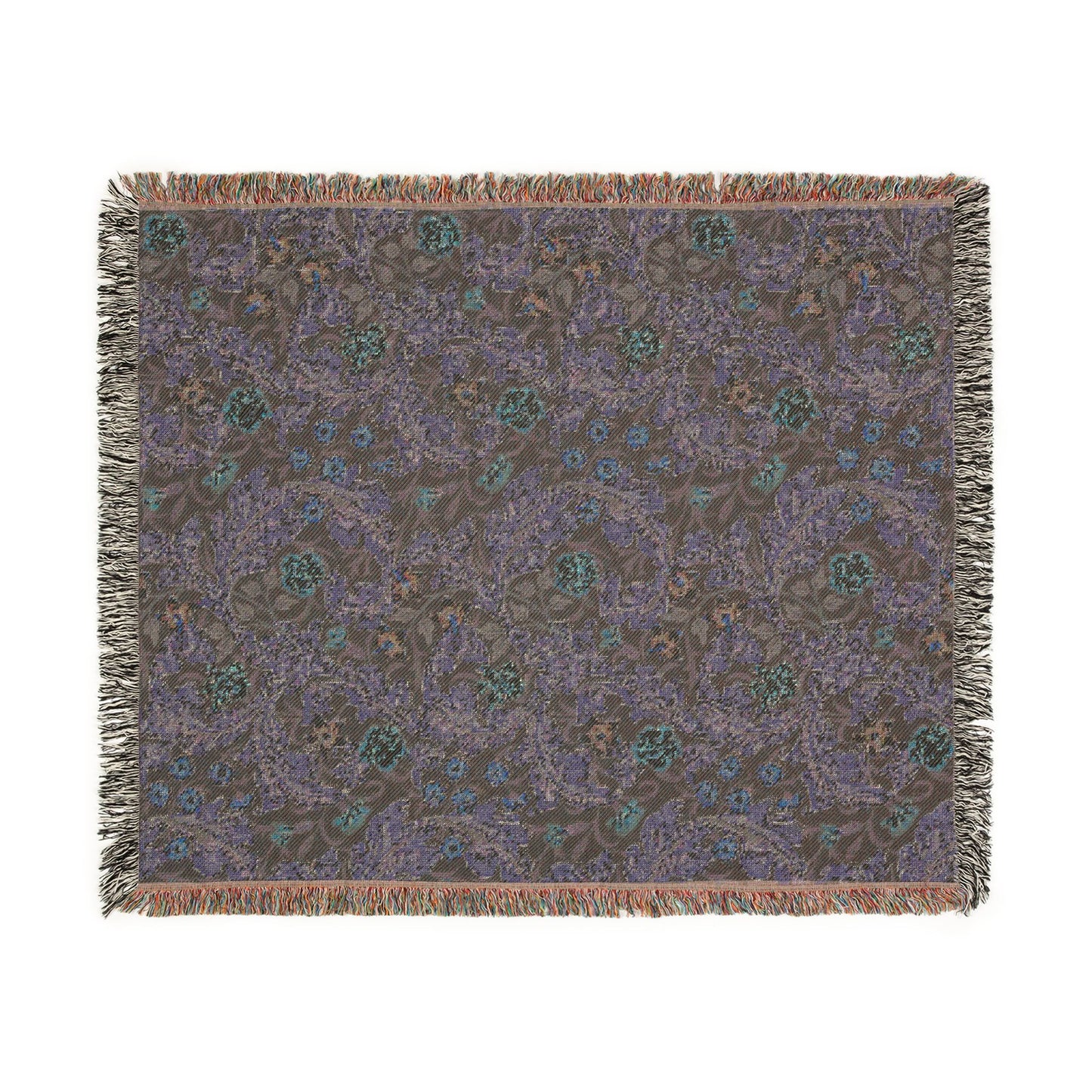 Patterned throw blanket with fringe on a white background