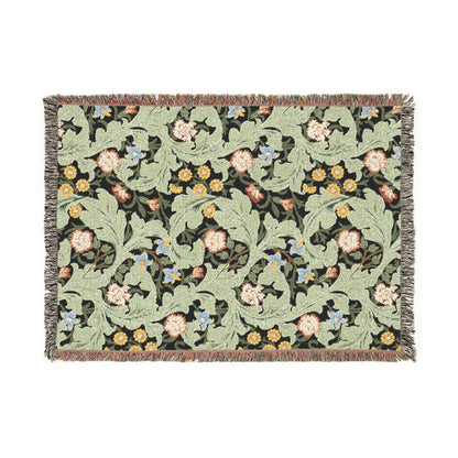 Floral patterned throw blanket on a white background