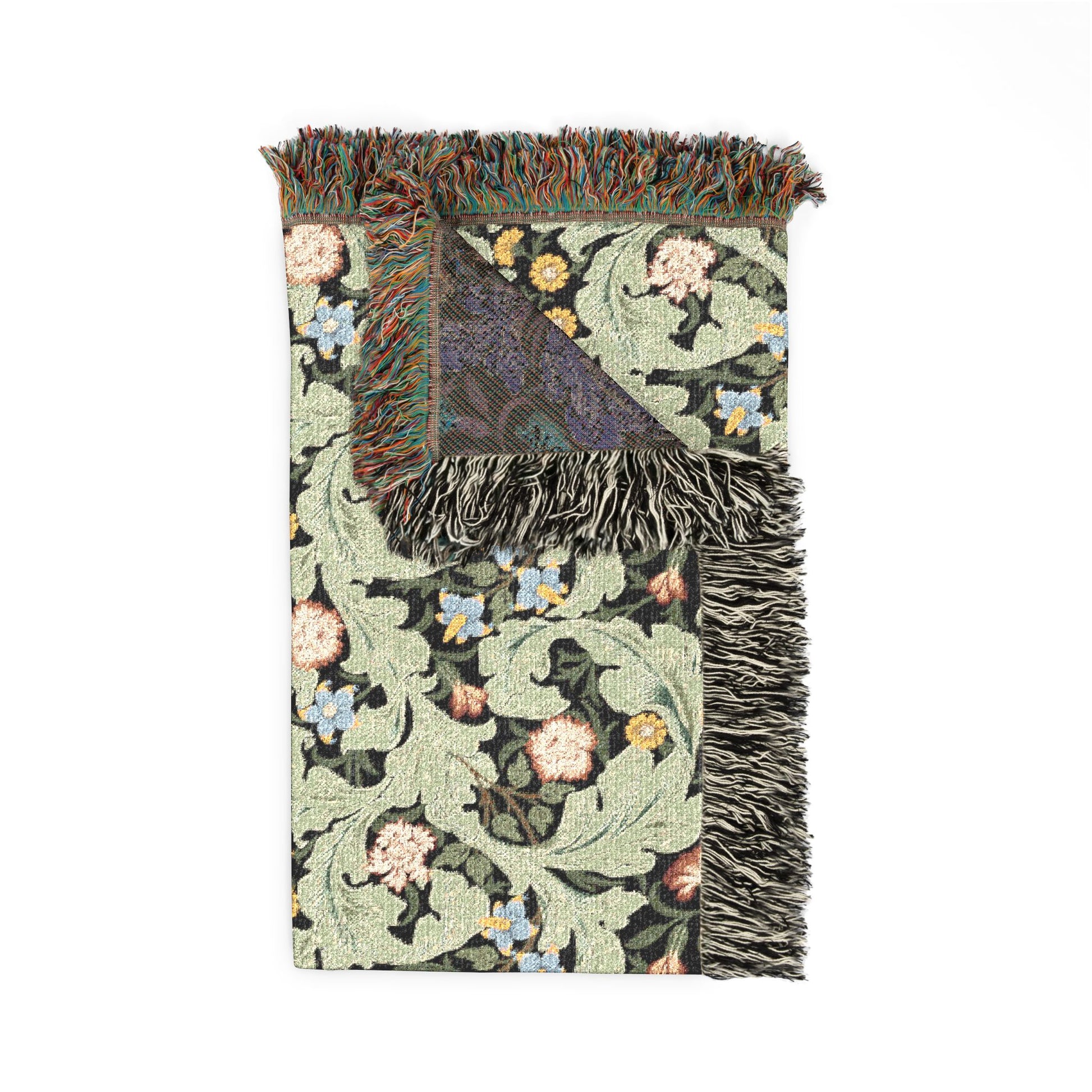 Decorative rug with floral patterns and fringe on a white background