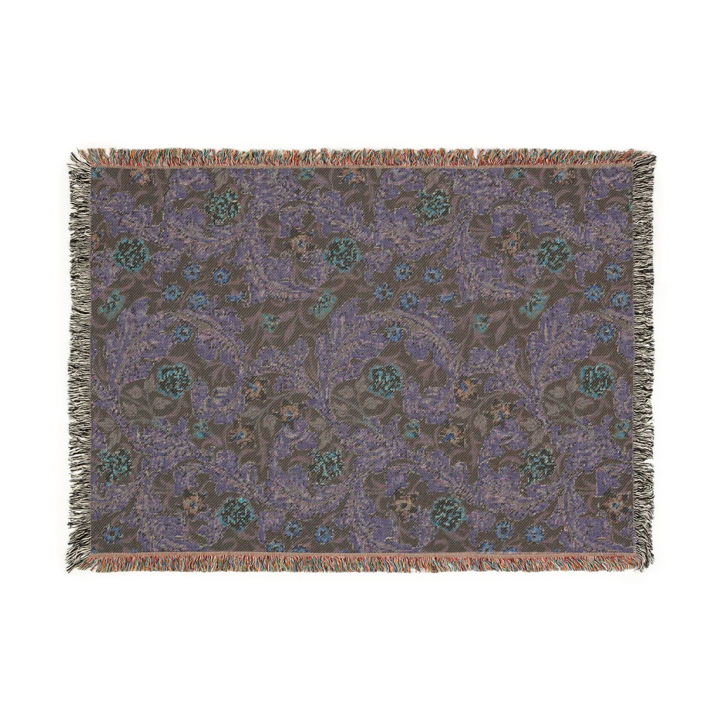 Patterned throw blanket with fringe on a white background
