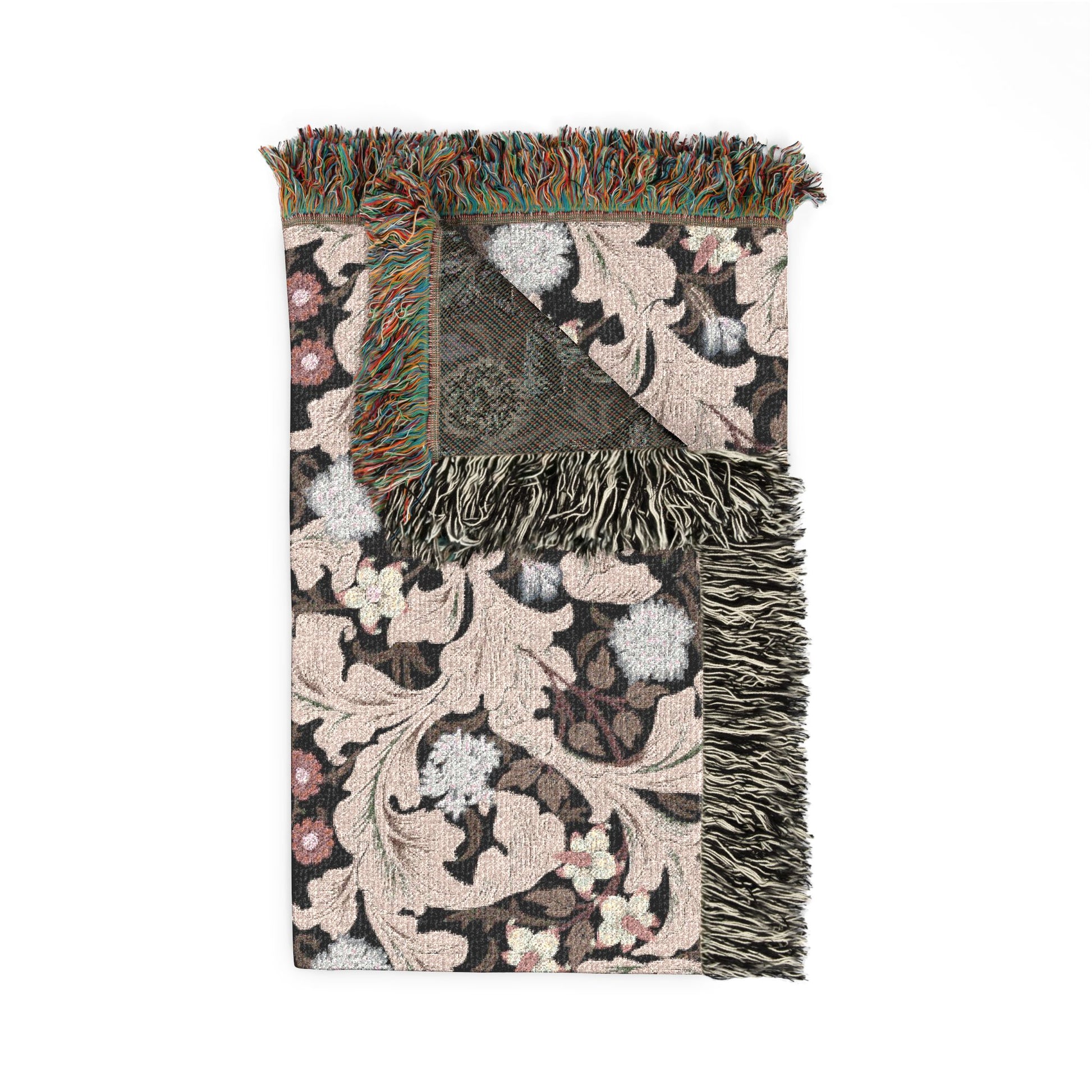 Floral patterned throw blanket with fringes on a white background