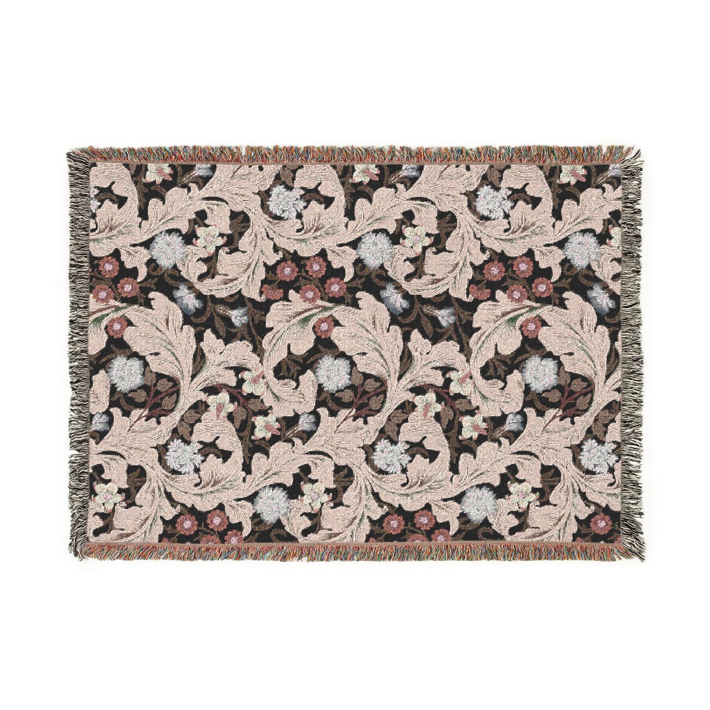 Decorative woven blanket with floral pattern on a white background
