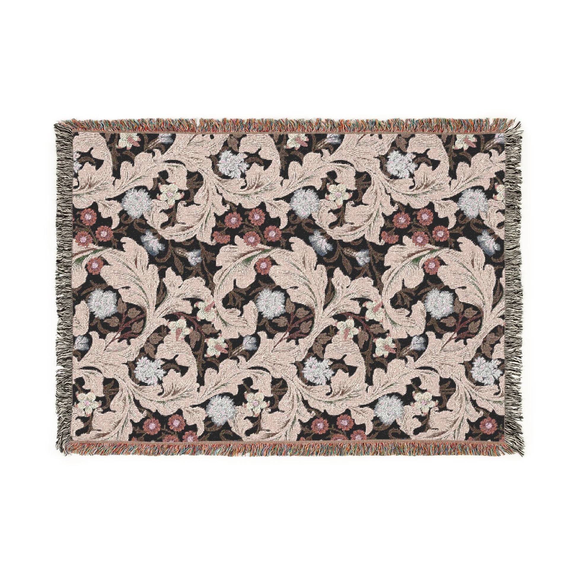 Decorative woven blanket with floral pattern on a white background