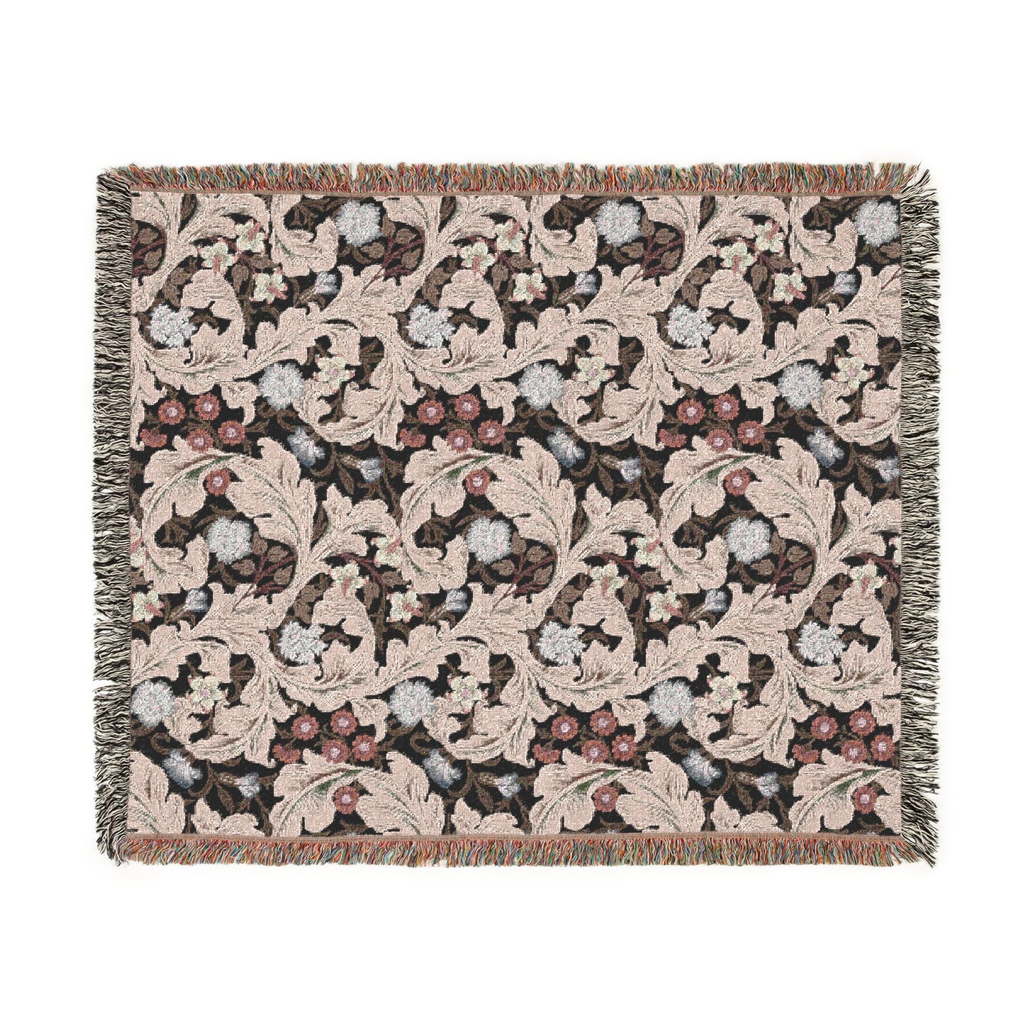 Decorative throw blanket with intricate floral pattern on a white background