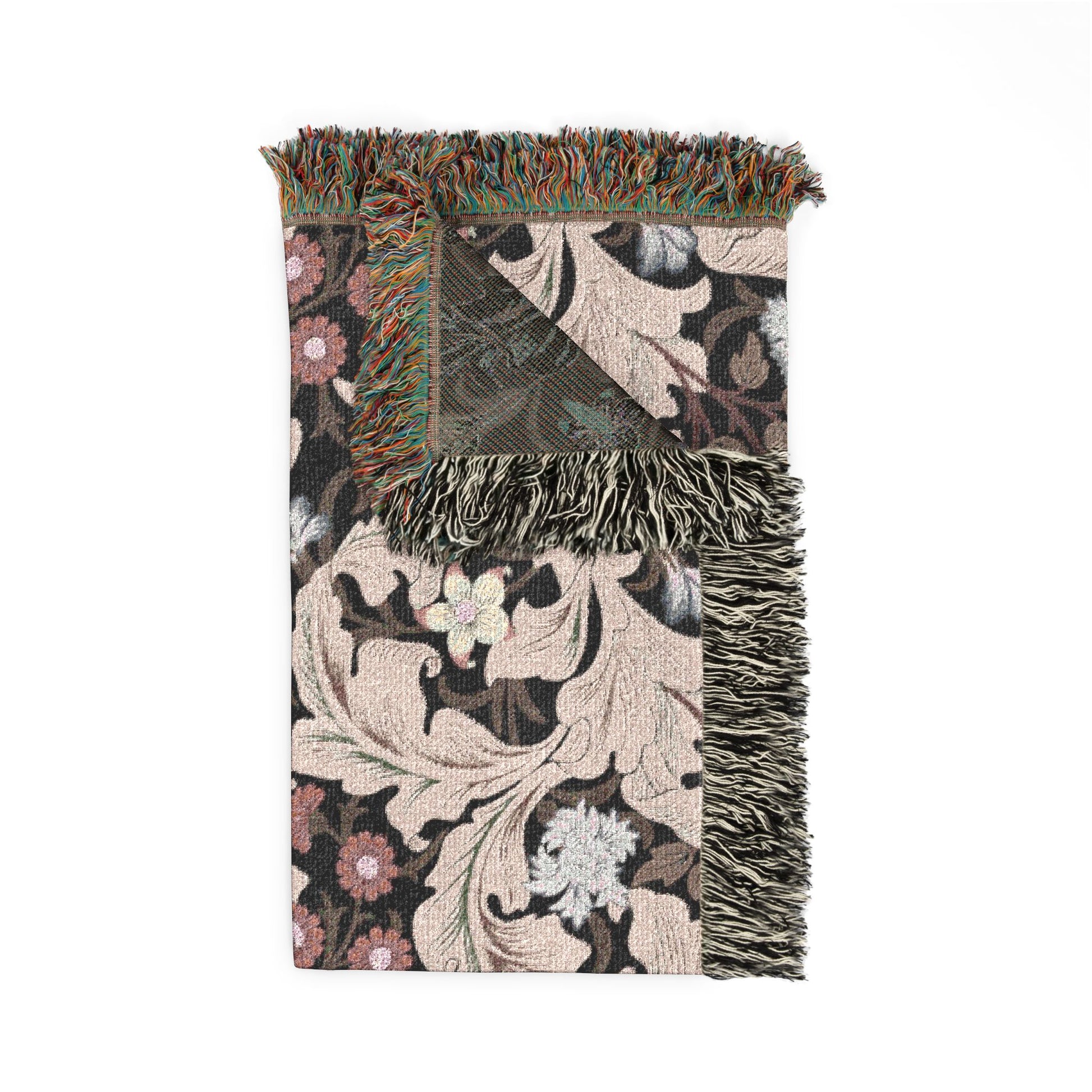 Floral patterned throw blanket with fringes on a white background
