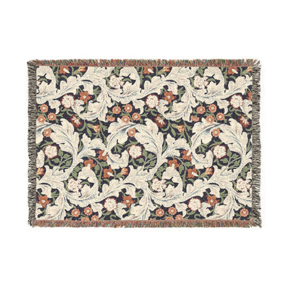 Decorative throw blanket with floral pattern on a white background