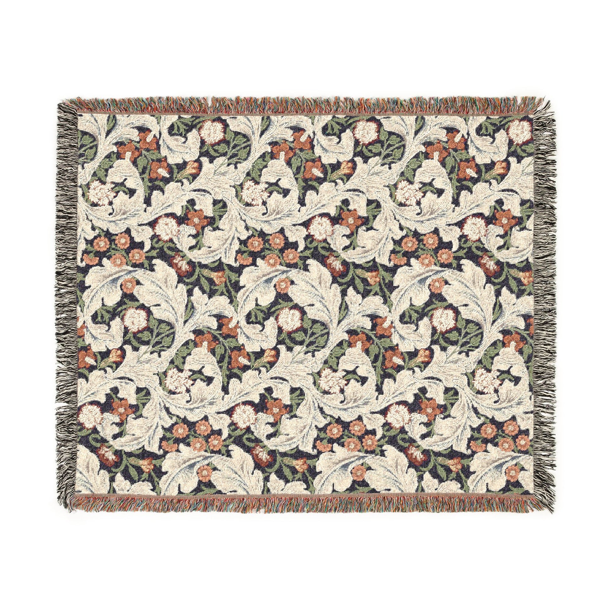 Floral patterned throw blanket with fringe on a white background