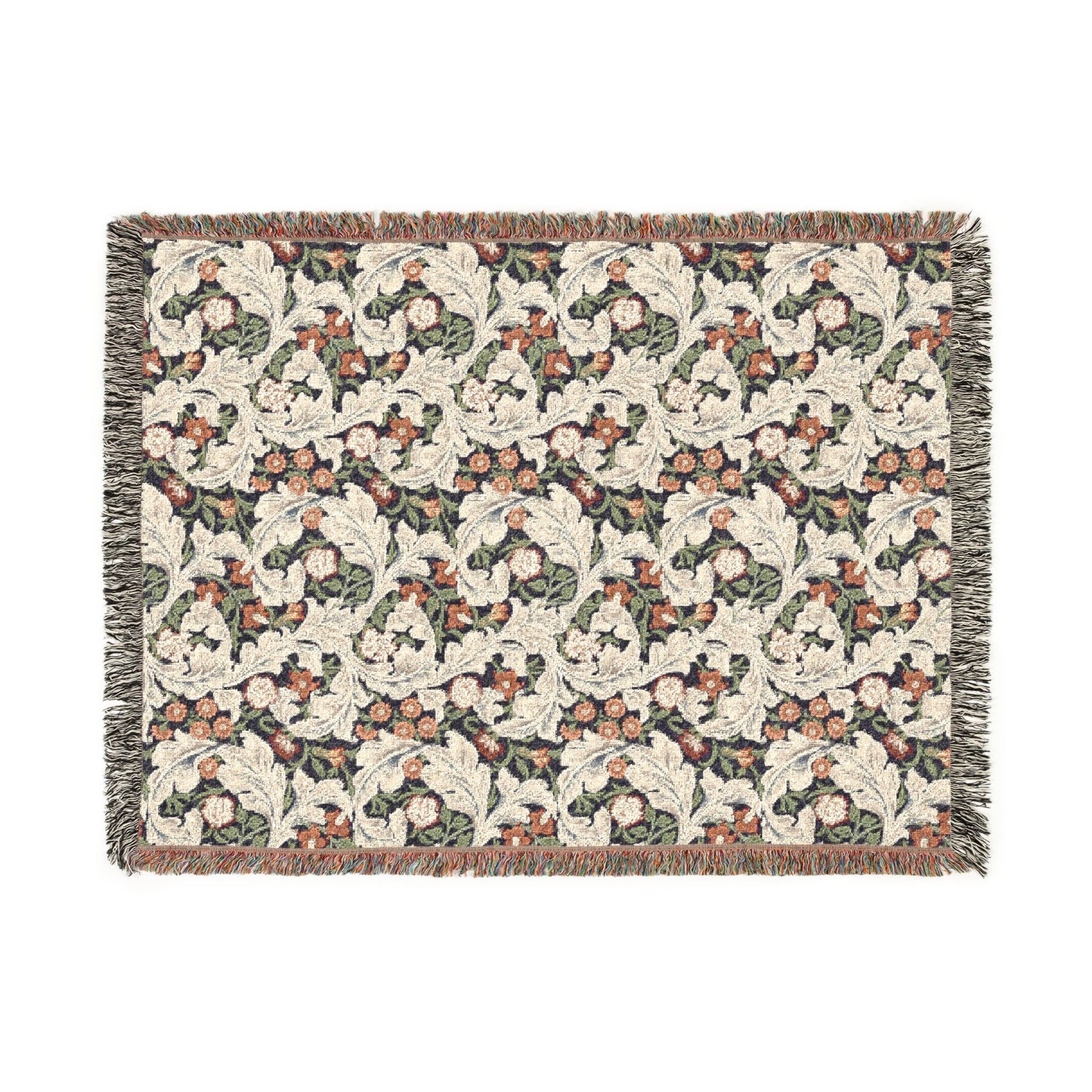 Floral patterned throw blanket with fringe on a white background