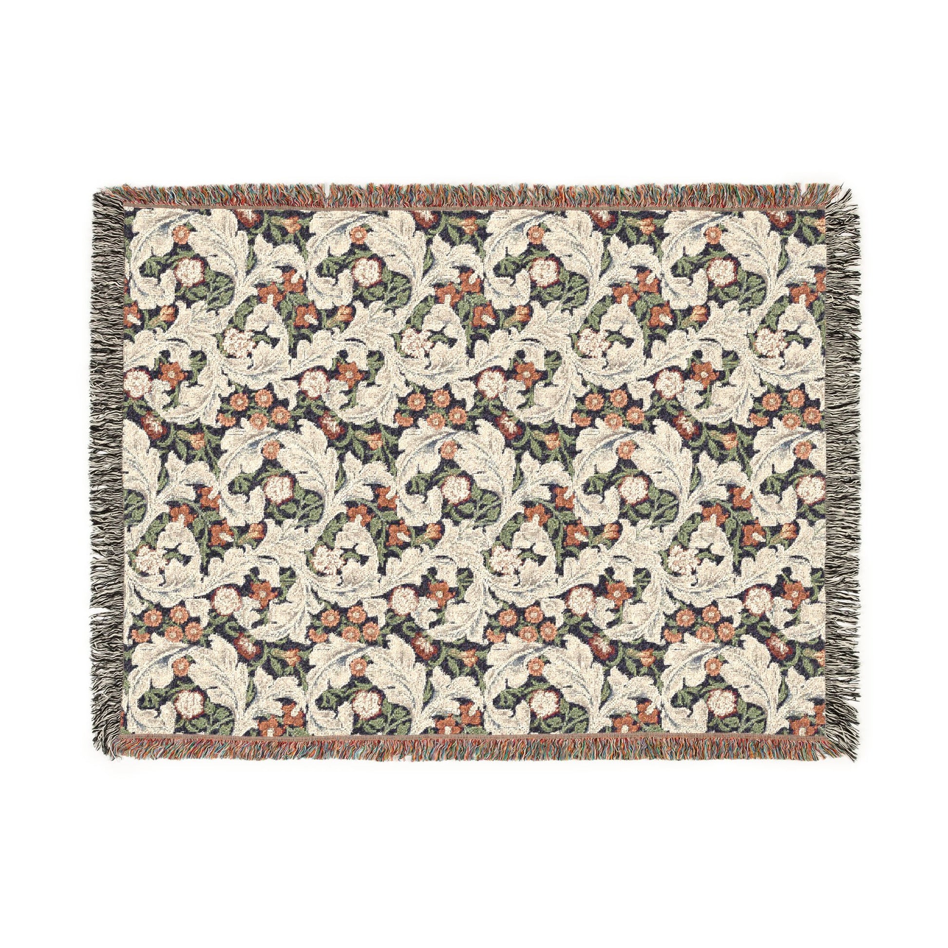 Floral patterned throw blanket with fringe on a white background