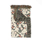Decorative rug with floral pattern and fringed edges on a white background