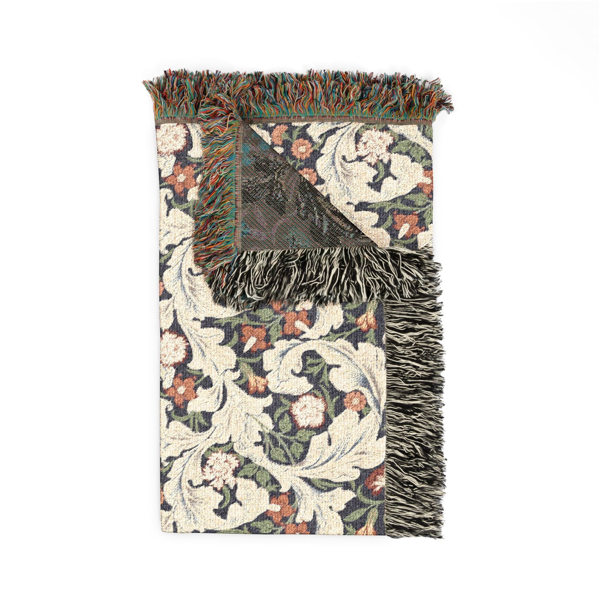 Decorative rug with floral pattern and fringed edges on a white background