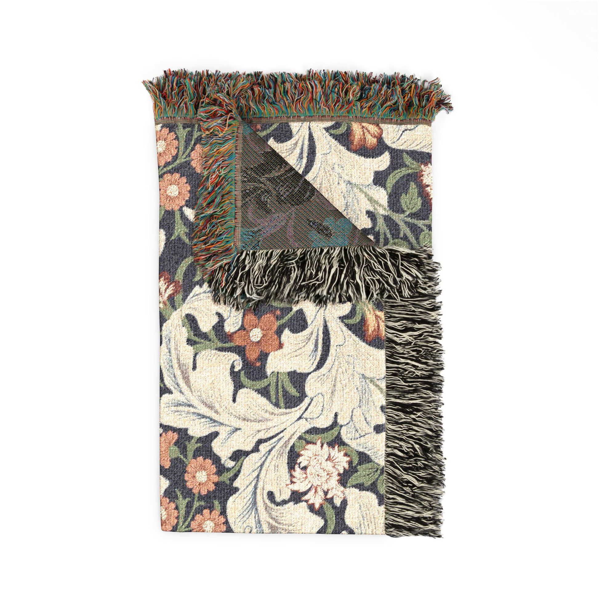 Floral patterned throw blanket with fringes on a white background