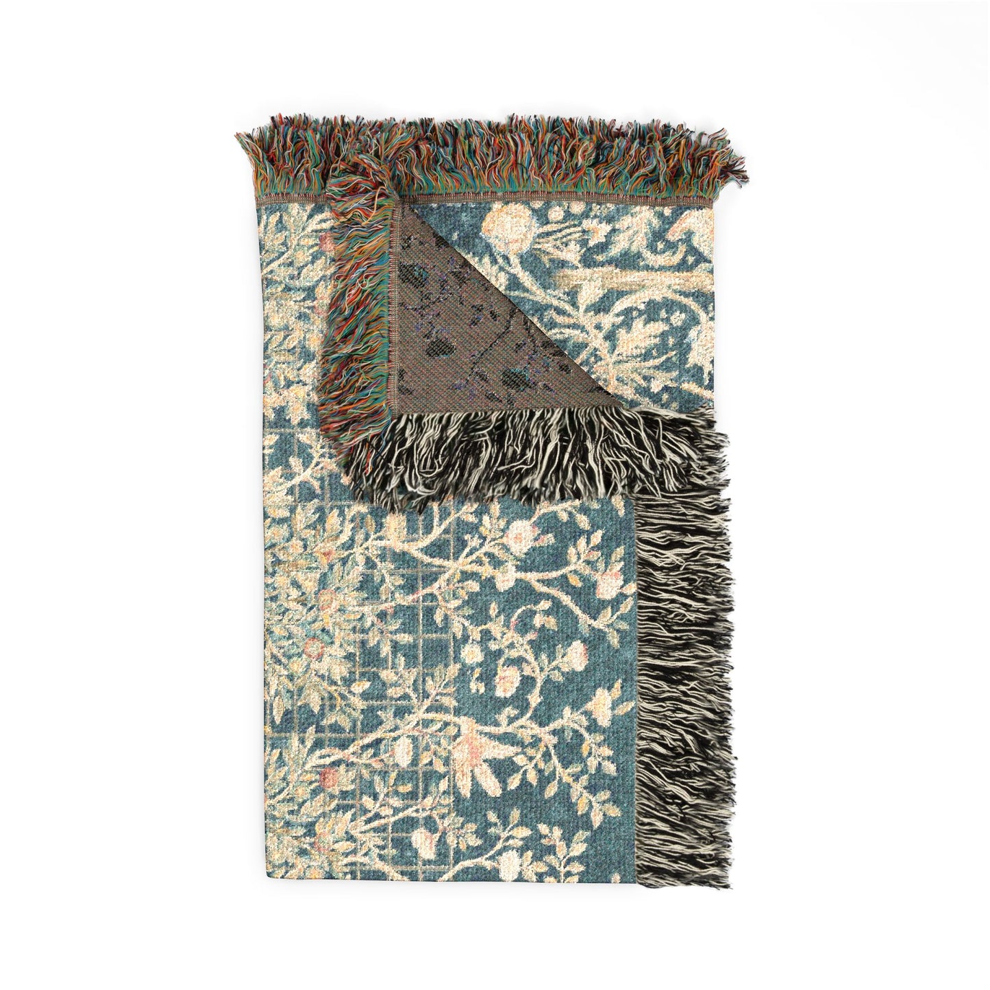 Decorative rug with floral pattern and fringed edge on a white background