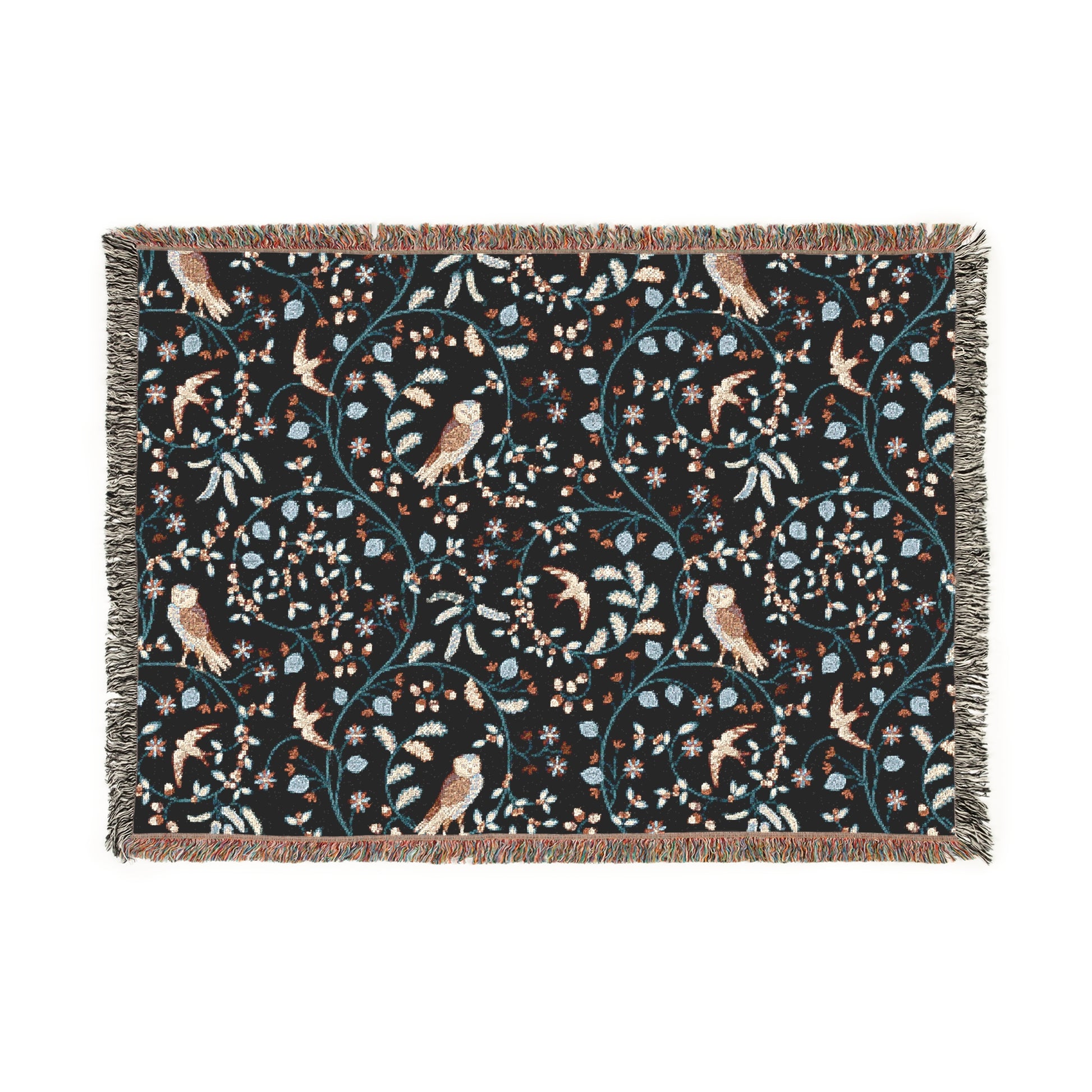 Decorative blanket with bird and floral pattern on a black background