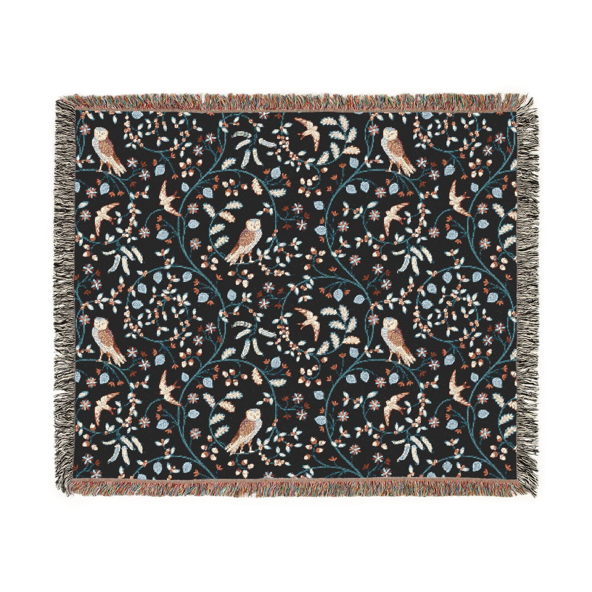 Decorative blanket with owl and floral pattern on a black background