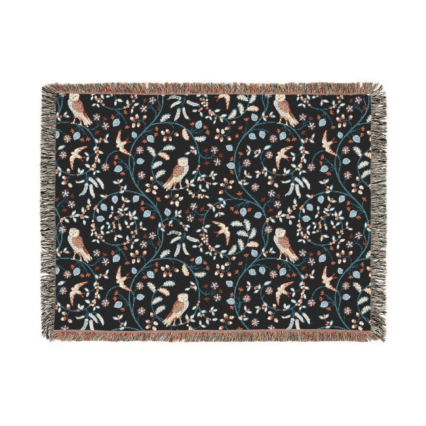 Decorative throw blanket with bird and floral pattern on a black background