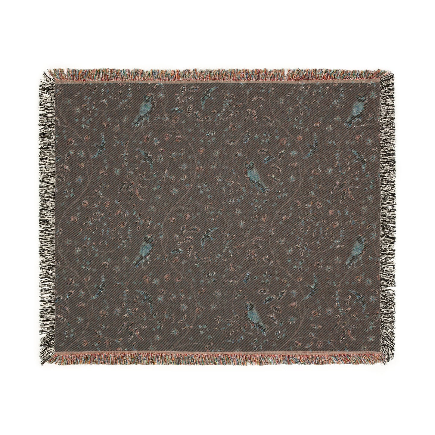 Decorative throw blanket with bird pattern on a plain background