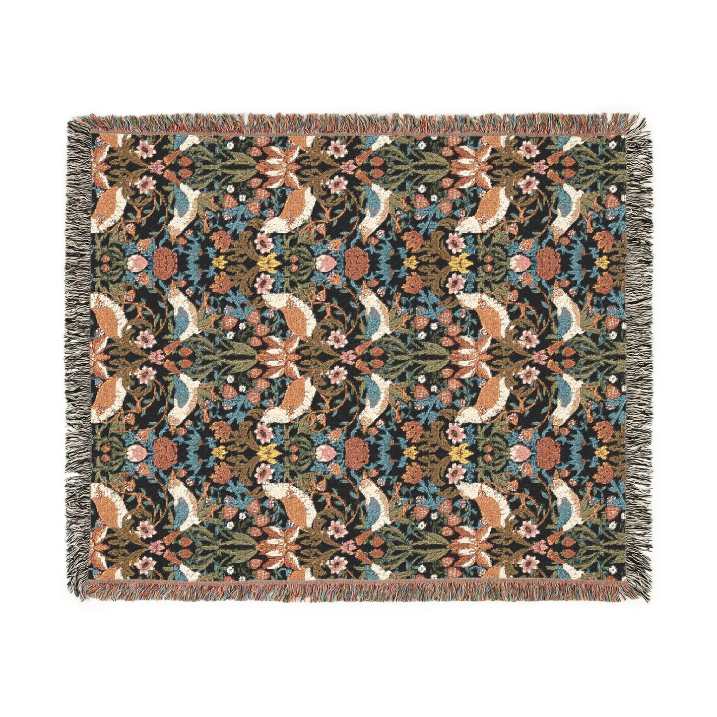Woven blanket with fox and floral pattern on a white background