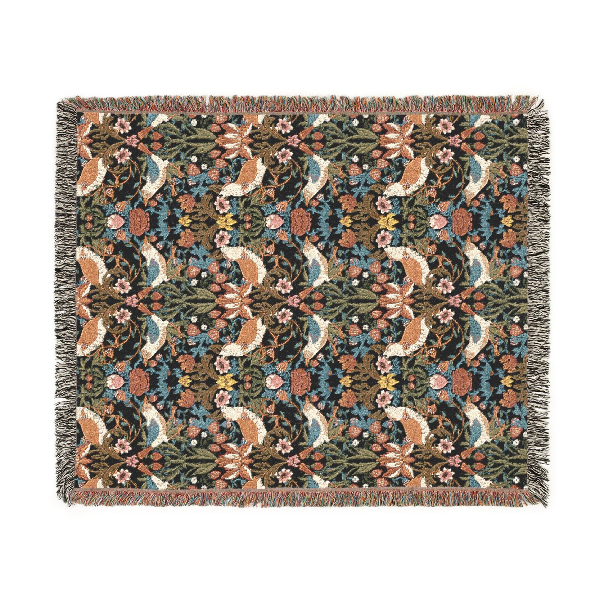 Woven blanket with fox and floral pattern on a white background
