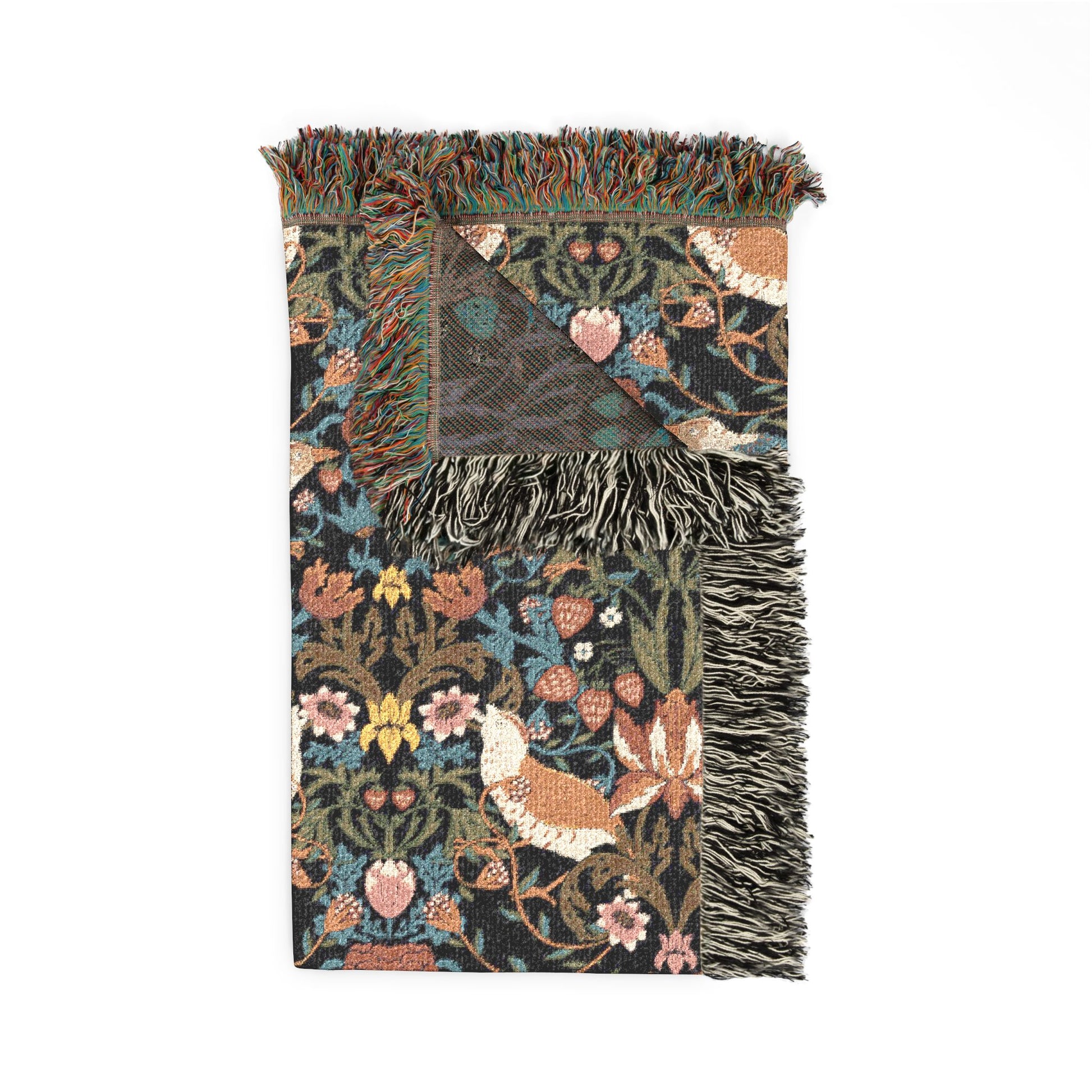 Decorative throw blanket with floral and bird pattern on a white background