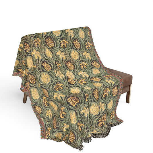 Plaid blanket draped over a chair on a white background