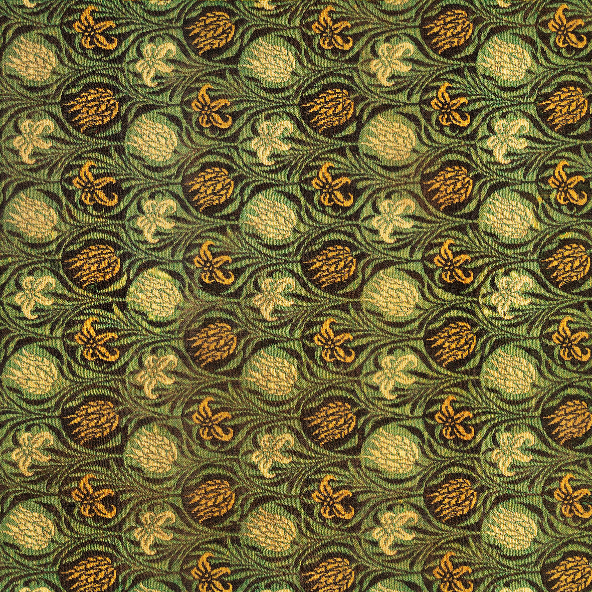 Patterned fabric with green and gold design