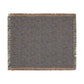 Patterned throw blanket with fringe on a white background